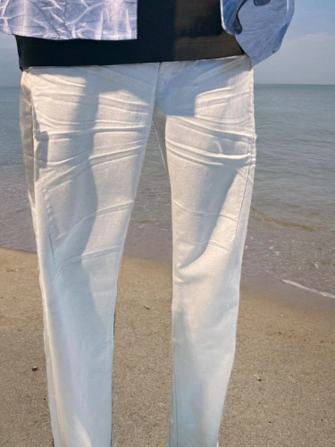 suit trousers,beach background,men's suit,trouser buttons,bermuda shorts,man at the sea,trousers,sand seamless,pocket flap,white-collar worker,beach shoes,male model,walk on the beach,khaki pants,jeans pattern,advertising figure,white clothing,a uniform,man's fashion,one-piece garment,Male,Southern Europeans,L,Confidence,T-shirt and Jeans,Outdoor,Beach