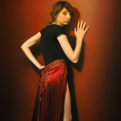 milioti,lady in red,retro woman,vintage woman,dark red,a floor-length dress,anchoress,long dress,man in red dress,female model,sari,red skirt,red gown,girl in a long dress,satine,art deco woman,retro women,reimposing,fashion shoot,flamenco