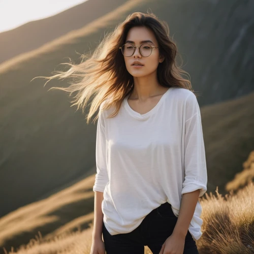 girl in t-shirt,girl on the dune,mongolian girl,with glasses,photochromic,white shirt,akanishi,cotton top,windblown,dolman,alycia,silver framed glasses,filippa,hapa,glasses,jutlandic,cornelisse,portrait background,eurasians,windswept,Photography,Fashion Photography,Fashion Photography 08