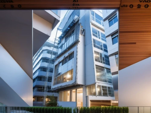 appartment building,modern architecture,glass facade,interlace,residential building,apartment building,multistory,staybridge,block balcony,an apartment,apartment block,lofts,cubic house,multistorey,condominia,apartments,multifamily,residencial,modern building,sky apartment,Photography,General,Realistic