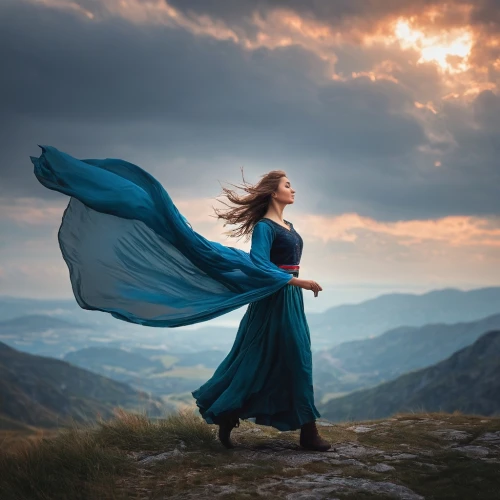 little girl in wind,celtic woman,eurythmy,girl in a long dress,mystical portrait of a girl,whirling,mountain spirit,gracefulness,the spirit of the mountains,shepherdess,windswept,windblown,wuthering,forwardly,enchantment,rumi,eilonwy,sylphides,sylphide,passion photography,Photography,Documentary Photography,Documentary Photography 14