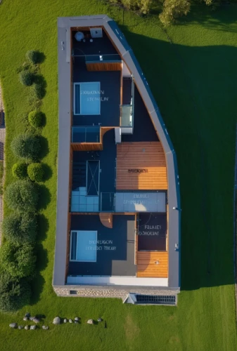 dunes house,vitra,view from above,drone image,bird's-eye view,inverted cottage,turf roof,passivhaus,danish house,from above,lohaus,landhaus,corten steel,drone shot,field barn,exzenterhaus,drone photo,cube house,flock house,aerial shot,Photography,General,Realistic