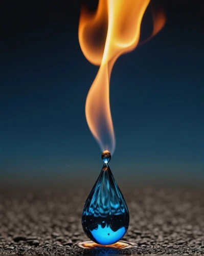flaming sambuca,bottle fiery,fire and water,waterdrop,a drop of water,spinning top,drop of water,the eternal flame,water drop,firewater,water droplet,no water on fire,bluebottle,oil lamp,flambe,extinguishing,gota,flickering flame,a drop,fire eater,Photography,General,Realistic