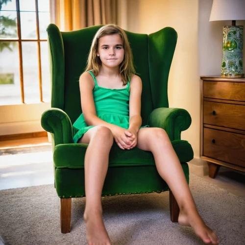 girl sitting,relaxed young girl,sitting on a chair,green dress,in green,children's christmas photo shoot,in seated position,children's photo shoot,granddaughter,armchair,portrait photographers,chairwoman,seated,photographing children,young girl,christmas pictures,blonde on the chair,girl in a long,legs crossed,saria,Photography,General,Realistic