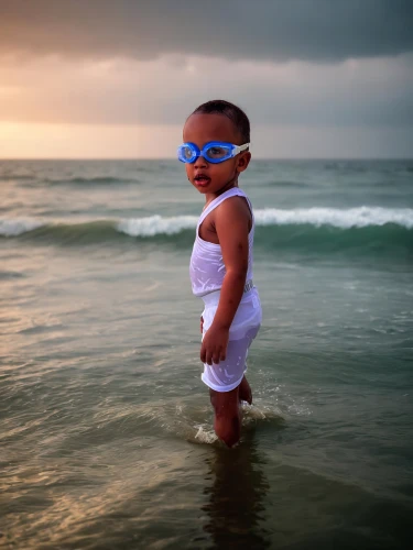 water bug,toddler walking by the water,swimming goggles,postprocessing,beachgoer,swimmer,baywatch,photographing children,sunwear,beachcomber,young model,gautham,photo shoot with edit,boy model,fusion photography,splash photography,tideman,surfwear,beach background,oakley