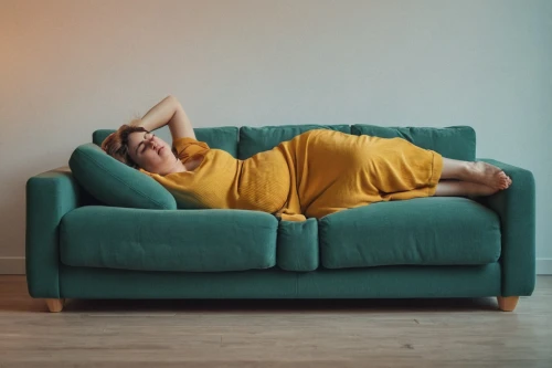 sofa,yellow jumpsuit,couch,woman laying down,sofaer,ekornes,sofa set,mid century sofa,sofa cushions,woman on bed,beanbag,reclined,couchsurfing,endometriosis,reclining,armchair,beanbags,sleeping bag,ron mueck,soft furniture,Photography,Documentary Photography,Documentary Photography 16