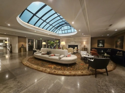 luxury home interior,foyer,luxury home,home interior,penthouses,cochere,luxury property,entrance hall,lobby,loft,mansion,family room,great room,luxury bathroom,casa fuster hotel,hallway,livingroom,palatial,large home,living room