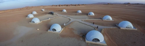 cube stilt houses,admer dune,odomes,roof domes,earthship,roundhouses,dunes house,superadobe,libyan desert,futuristic architecture,domes,masdar,crescent dunes,futuristic landscape,huts,sandworms,san dunes,kufra,hadhrami,arrakis,Photography,General,Realistic