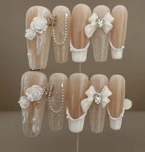 votive candles,wedding rings,moonstones,champagne glasses,nail design,wedding glasses,bridal shoes,bridal jewelry,coral fingers,angel lanterns,votives,organza,boutonnieres,tealights,hair clips,wedding cupcakes,hair accessories,essie,nail art,polishes