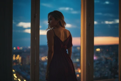 girl in a long dress from the back,silhouette,girl in a long dress,woman silhouette,soir,city lights,a girl in a dress,benoist,nightdress,parisienne,above the city,bokeh,paris balcony,city ​​portrait,top of the rock,the silhouette,citylights,window view,nightgown,overlooking,Photography,General,Cinematic