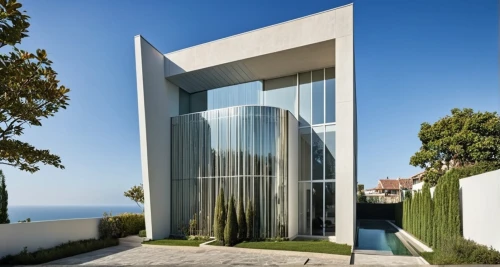 fresnaye,glass facade,dunes house,modern house,modern architecture,structural glass,glass wall,cubic house,escala,contemporary,mirror house,riviera,cube house,champalimaud,landscape design sydney,immobilier,arcona,luxury property,glass panes,tonelson,Photography,General,Realistic