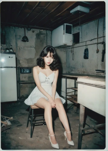 eggleston,girl in the kitchen,ronstadt,bettie,kitchen table,lepontine,golightly,vintage woman,joan collins-hollywood,vintage angel,vintage girl,domestica,cigarette girl,feist,deschanel,bjork,harmlessness,vintage kitchen,sitting on a chair,vintage women,Photography,Documentary Photography,Documentary Photography 03