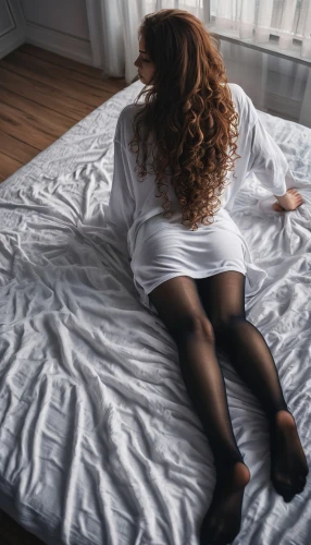 woman on bed,nylons,woman laying down,bedspread,girl in bed,tights,sheets,bed,hosiery,bedspreads,duvets,redhead doll,bedsheets,bednets,stockings,undercovers,white clothing,long socks,bed sheet,empty sheet,Photography,Documentary Photography,Documentary Photography 14