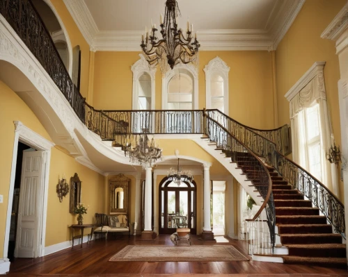 entrance hall,outside staircase,entryway,banisters,winding staircase,staircase,balusters,circular staircase,foyer,entryways,luxury home interior,hallway,wooden stair railing,staircases,cochere,interior decor,home interior,balustrade,hallway space,wainscoting,Photography,Artistic Photography,Artistic Photography 05