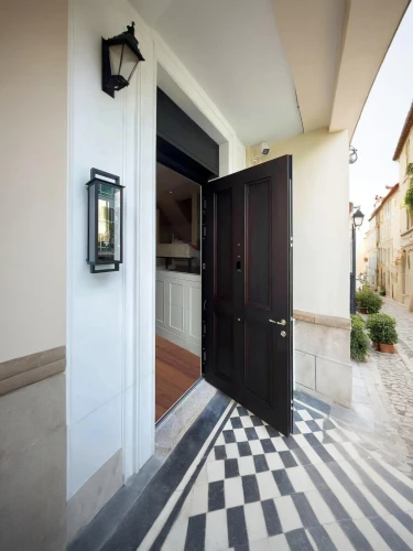 ceramic floor tile,marazzi,house entrance,metallic door,the threshold of the house,ceramic tile,greek island door,entryways,entranceway,doorsteps,entryway,front door,exterior decoration,entranceways,ceramiche,coverciano,spanish tile,floor tile,almond tiles,doorways