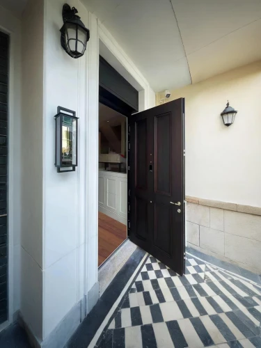 room door,creepy doorway,the threshold of the house,house entrance,tile kitchen,entryways,hallway space,ceramic floor tile,doorway,entryway,floor tiles,doorways,floor tile,enfilade,metallic door,marazzi,vintage kitchen,pantry,open door,victorian kitchen