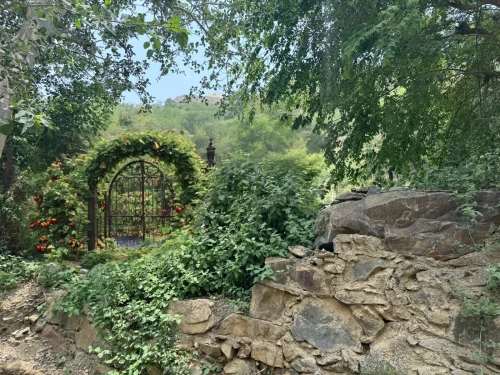 grotto,ojai,monastery garden,mehdiabad,rose arch,rudkhaneh,farm gate,khwaja,village gateway,garden door,el arco,quasr al-kharana,ziarat,stone gate,nangarhar,tepoztlan,bridalveil,darwaja,badarneh,nature garden