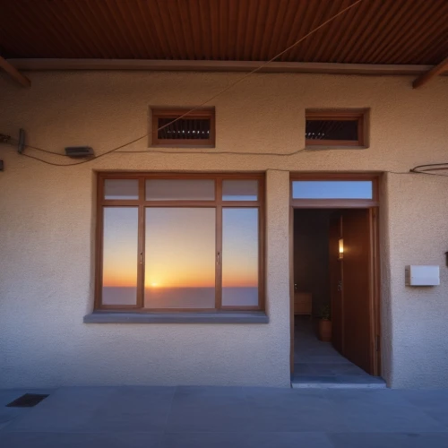 dunes house,stucco frame,marfa,house silhouette,window front,window with shutters,window with sea view,front door,manzanar,glass window,the threshold of the house,front window,exterior mirror,window released,dune ridge,electrochromic,window curtain,big window,window,doorway,Photography,General,Realistic