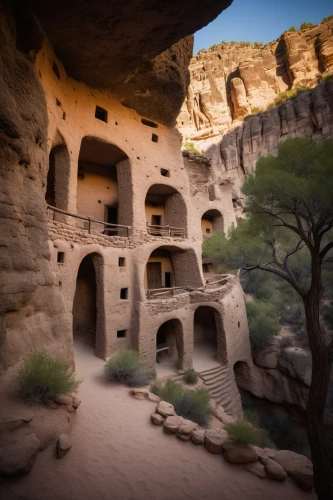 tuff stone dwellings,nabatean,ancient house,acoma,ancient buildings,cave church,nabataean,wukoki puebloan ruin,dwellings,pueblo,abiquiu,grottoes,petra,bandelier,three centered arch,khujo,ancient building,hualapai,stone oven,arches,Photography,General,Cinematic