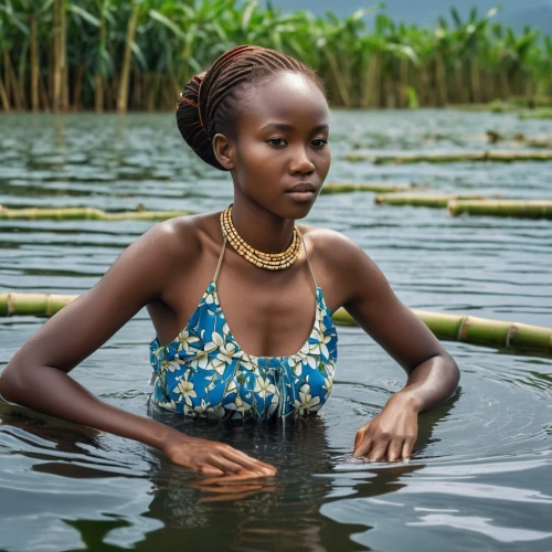 rwanda,danai,rwandan,african woman,rwandas,africaine,water nymph,burundians,lake victoria,africana,burundian,girl on the river,africaines,rwandans,wateraid,aminata,liberian,amazonica,byanyima,maliana