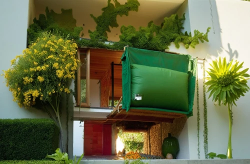 garden door,balcony garden,house entrance,balconied,hanging plants,entryway,doorway,flower boxes,showhouse,hanging plant,green living,model house,cubic house,block balcony,container plant,flower box,vivienda,entryways,house pineapple,pergola,Photography,General,Realistic