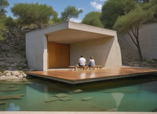 inverted cottage,pool house,cubic house,summer house,dunes house,aqua studio,cube house,amanresorts,mikveh,cave on the water,pavillon,zumthor,mikvah,corten steel,archidaily,dug-out pool,siza,house with lake,floating stage,cooling house