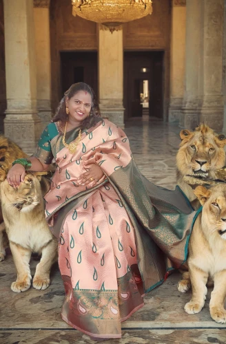 she feeds the lion,rajah,royal bengal,dynasties,kanimozhi,maharani,jayalalitha,lionizing,barkha,khaleda,kattabomman,lionesses,brazilian monarchy,mamata,maraj,lions,iraklion,lion children,mamta,bengalenuhu