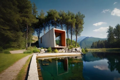 house with lake,inverted cottage,mirror house,house by the water,cubic house,zumthor,house in the mountains,corten steel,house in mountains,summer house,the cabin in the mountains,pool house,snohetta,amanresorts,houseboat,holiday home,cube stilt houses,swiss house,wooden house,chalet