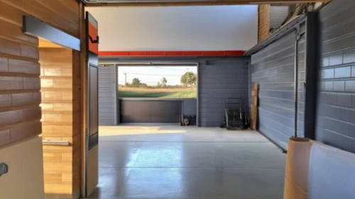 mudroom,garage,walk-in closet,garages,shipping container,prefabricated buildings,hinged doors,wardrobes,hallway space,shipping containers,breezeway,lockers,dojo,dugout,closets,chicken coop door,cardrooms,driving range,entryway,eichler