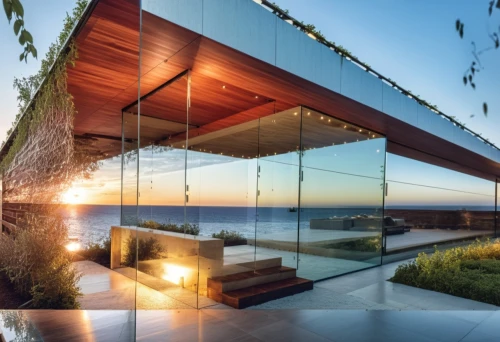 dunes house,cubic house,glass wall,mirror house,house by the water,snohetta,structural glass,oceanfront,glass facade,window with sea view,corten steel,cube house,glass panes,esalen,cube stilt houses,beach house,glass blocks,cantilevered,cantilevers,glass window,Photography,General,Realistic
