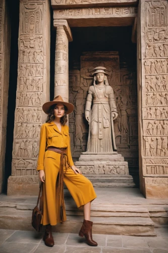 egyptian temple,middle eastern monk,yellow jumpsuit,egyptologist,antiquities,egyptienne,girl in a historic way,ancient egyptian girl,egypt,orange robes,caftans,the ancient world,egyptian,kemet,pharaonic,sekhmet,hatshepsut,nefertiti,travel woman,priestesses,Photography,Documentary Photography,Documentary Photography 05