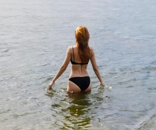 juliya,the blonde in the river,mermaid silhouette,in water,on the shore,body of water,rivieras,diani,the body of water,malibu,bikindi,ocean,swimmable,by the sea,verano,bikini,girl on the river,gili,mermaid tail,laucala