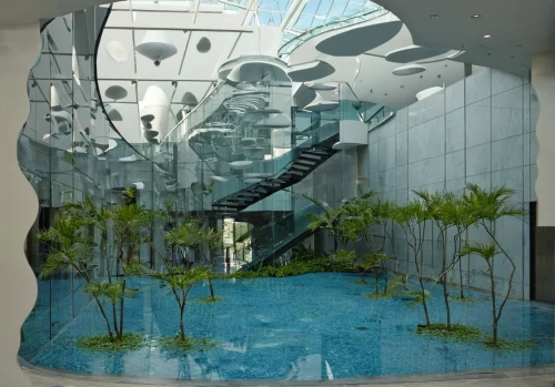 water cube,atrium,glass wall,diamond lagoon,atriums,aqua studio,glass building,water wall,morphosis,infosys,glass facade,water feature,futuristic architecture,safdie,water stairs,embl,water mirror,structural glass,futuristic art museum,biospheres,Photography,Documentary Photography,Documentary Photography 08