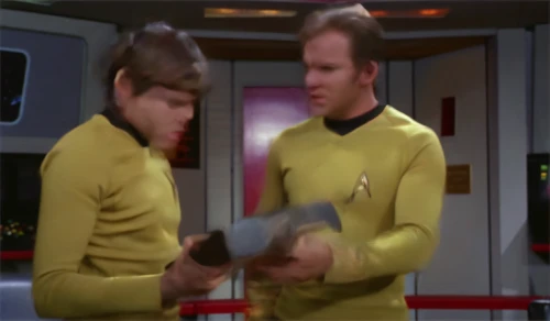 illogical,star trek,handshaking,data exchange,quark cheese,uss voyager,trek,quark,dialog boxes,voyager golden record,text space,data retention,bellboy,the visor is decorated with,data transfer,transaction,handheld television,cardassian-cruiser galor class,officers,long underwear