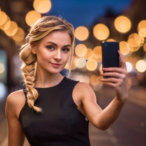 woman holding a smartphone,artificial hair integrations,blonde girl with christmas gift,blonde woman,black friday social media post,the blonde photographer,photo session at night,cyber monday social media post,mobile camera,portrait photographers,women in technology,connectcompetition,connect competition,mobile phone accessories,the app on phone,digital advertising,female model,htc,phone icon,digital data carriers