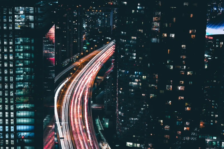 an aerial view of a city intersection in the night