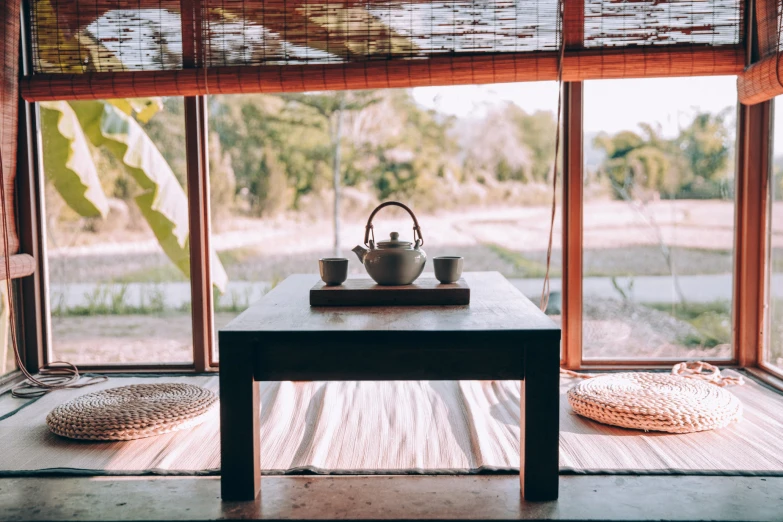 a table that has a tea pot on it