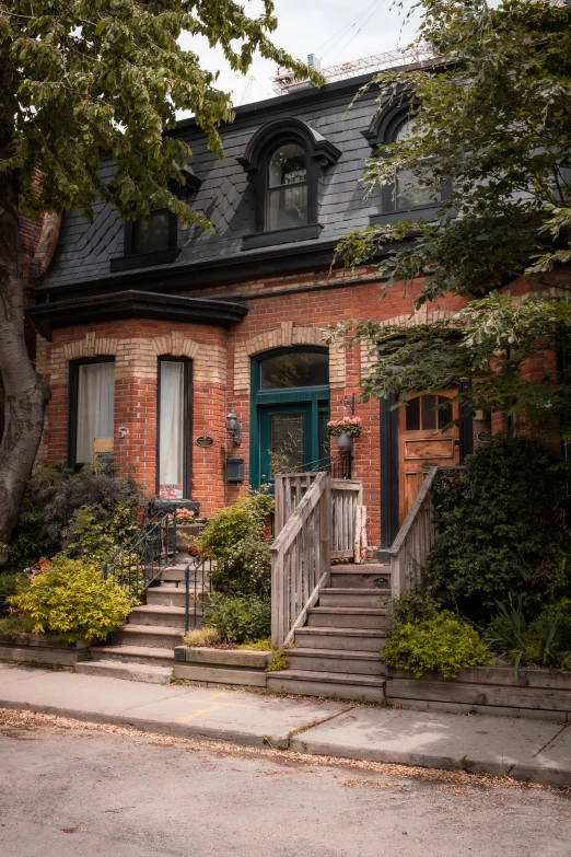 a small home with steps to the front door