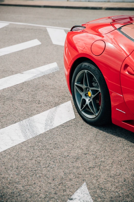 a close - up of a red sports car's ke rim