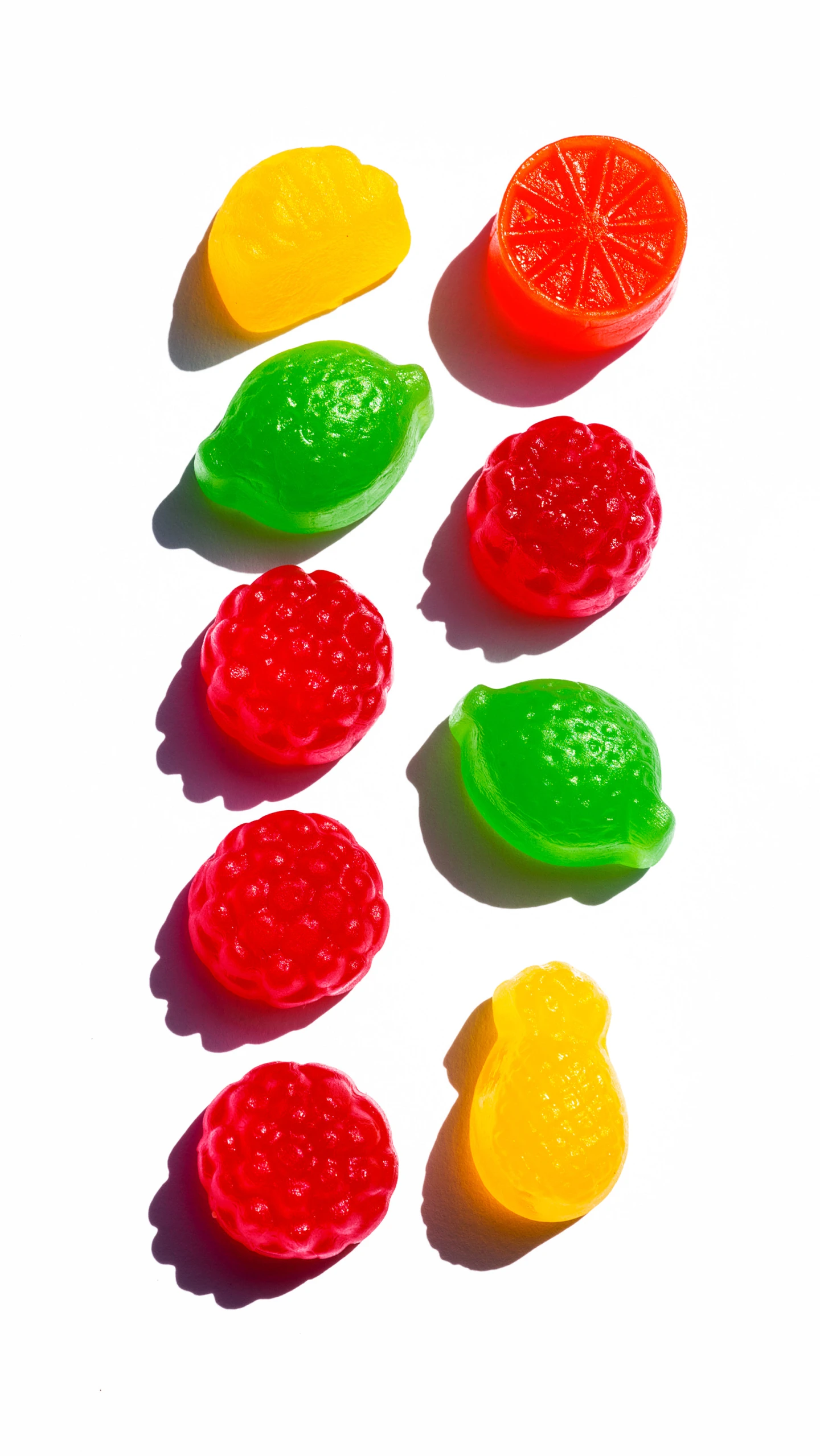 a bunch of candy candies sitting in the middle of a table