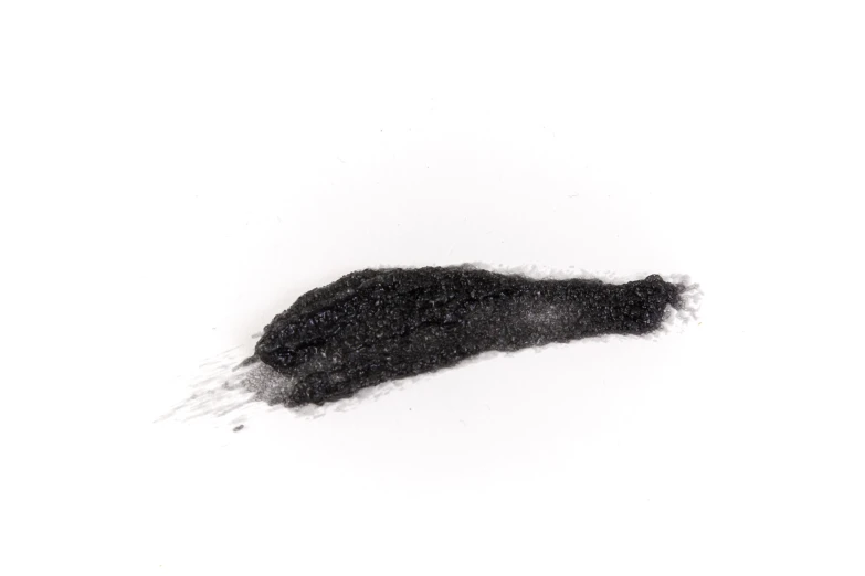 a black and white image of an opened hair pile