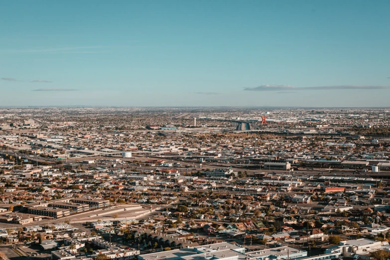 a view of a small urban area and blue sky