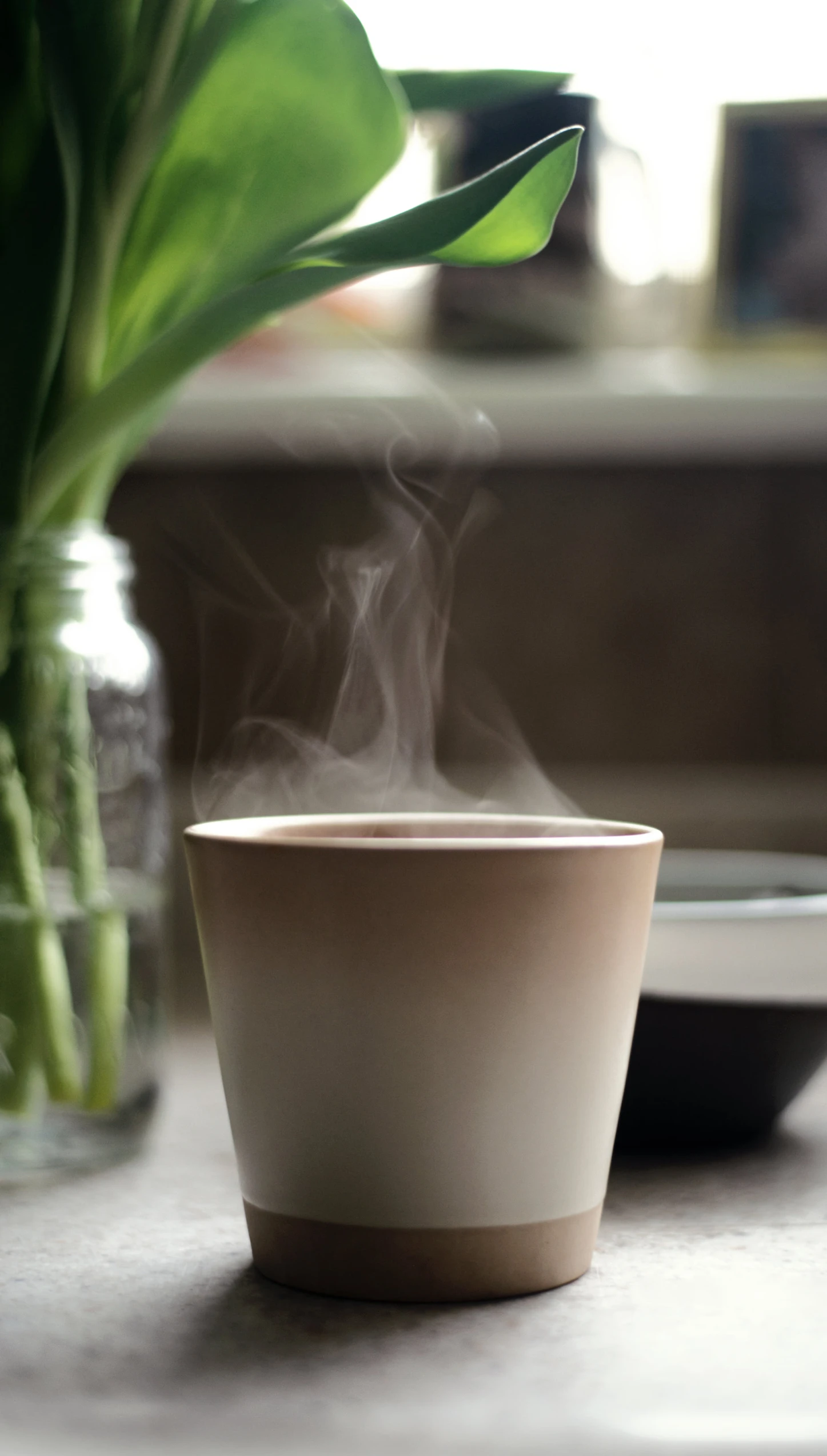 some steaming smoke is in a mug on a table