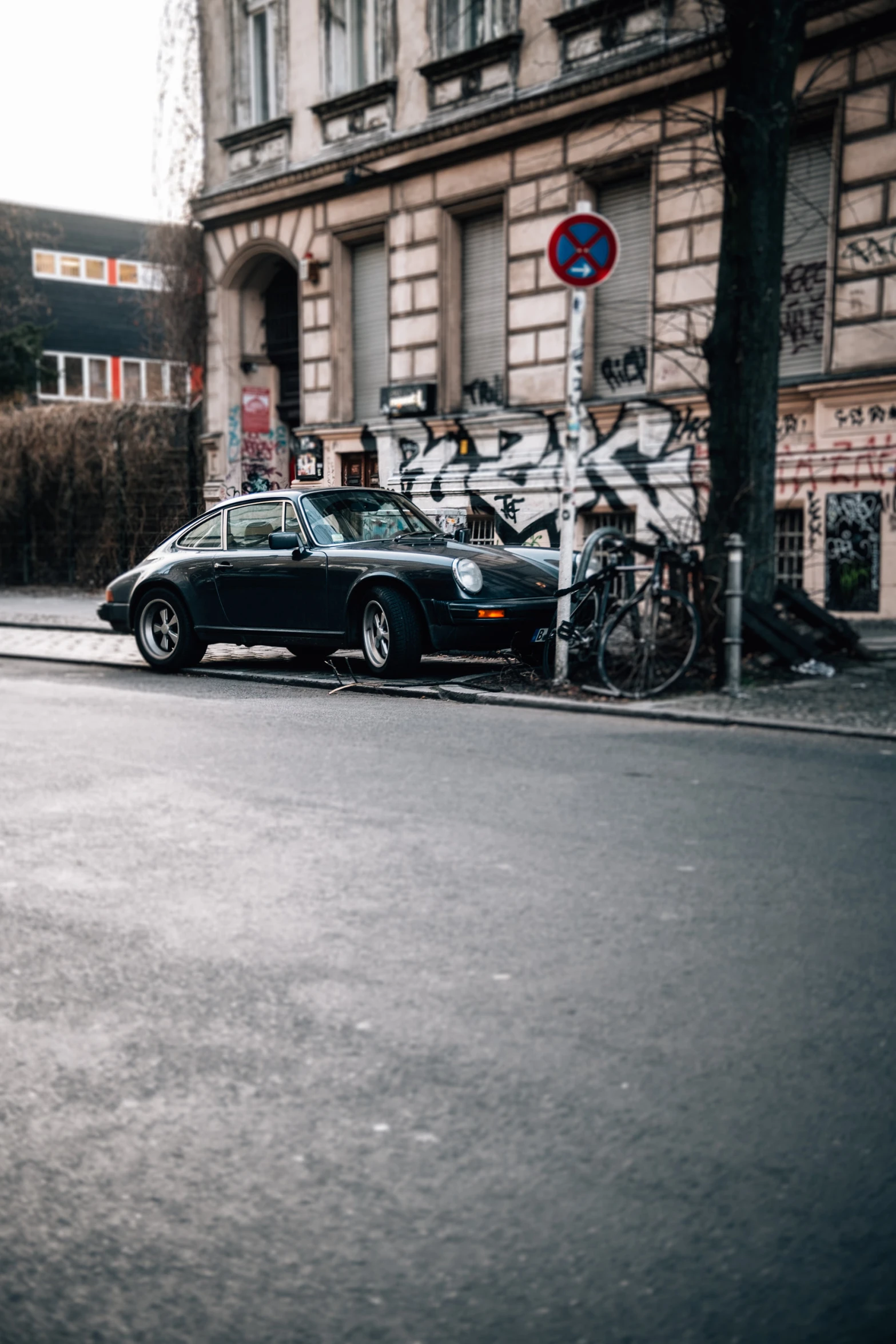 a car sits parked on the side of the road