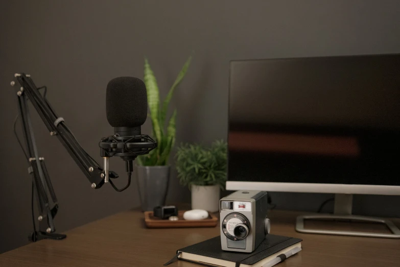 the sound equipment is in front of a microphone and speaker