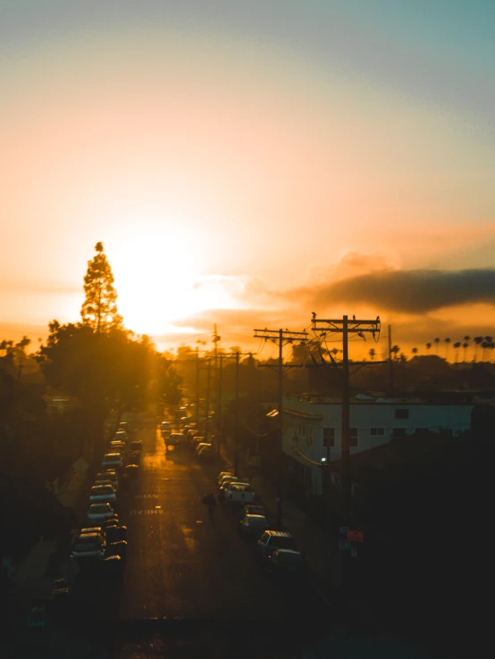 traffic at sunset with lightening on the horizon