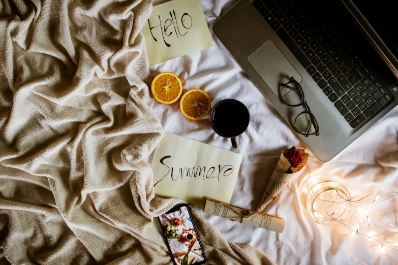 two orange slices sitting on top of some papers