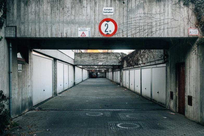 a tunnel with signs on the side of it