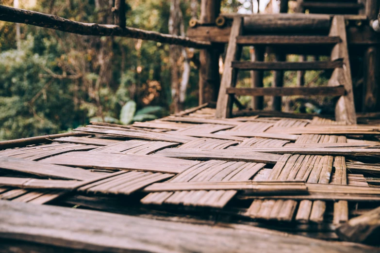 the boards are covered by mud and logs