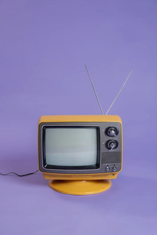 a small television set that is sitting on top of the table